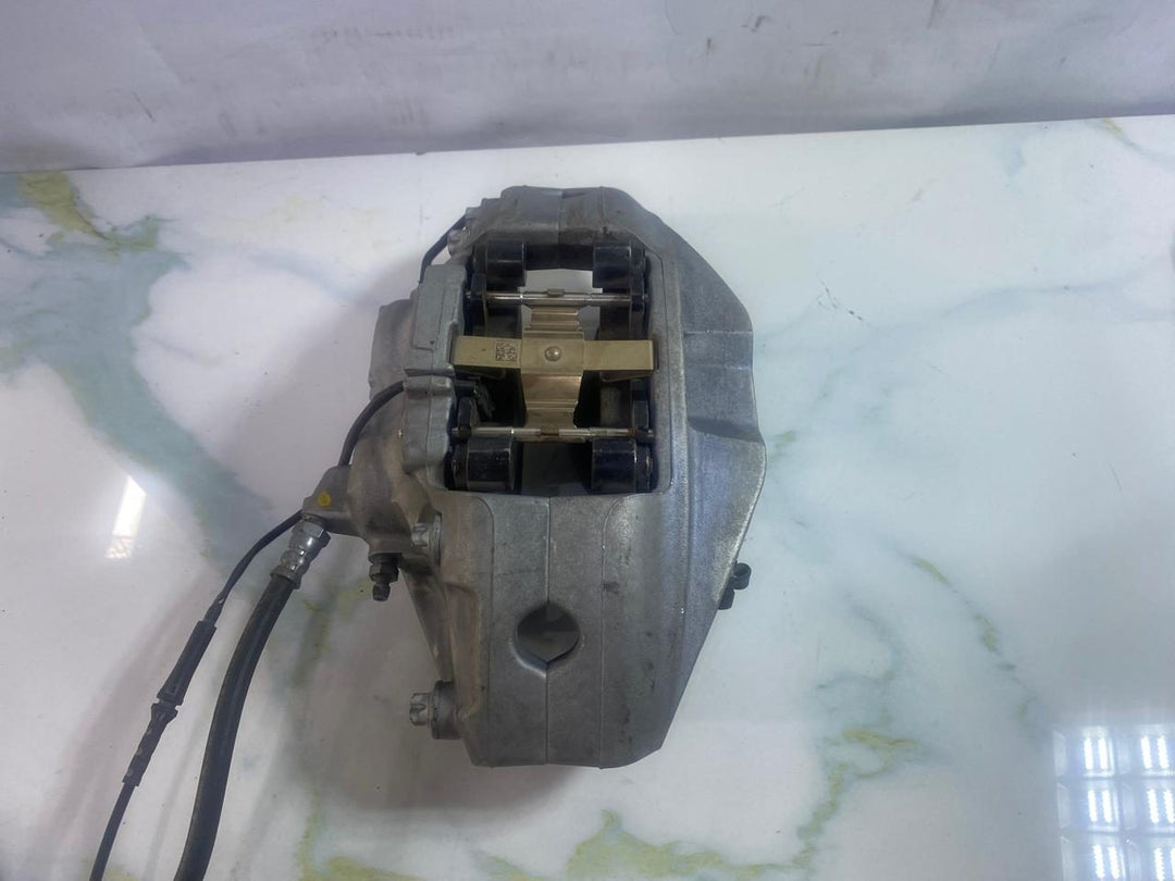 Front Brake Caliper Left, Part Number 8843331 BMW X5 G05 LCI 40I 2024