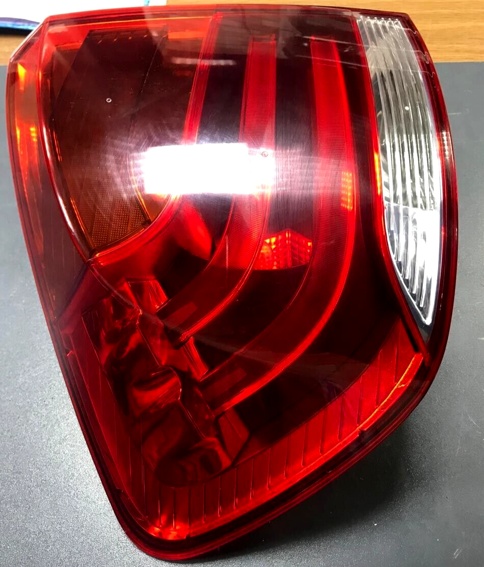 BMW X1 E84 LEFT SIDE REAR OUTER TAIL LIGHT  OEM 2990109