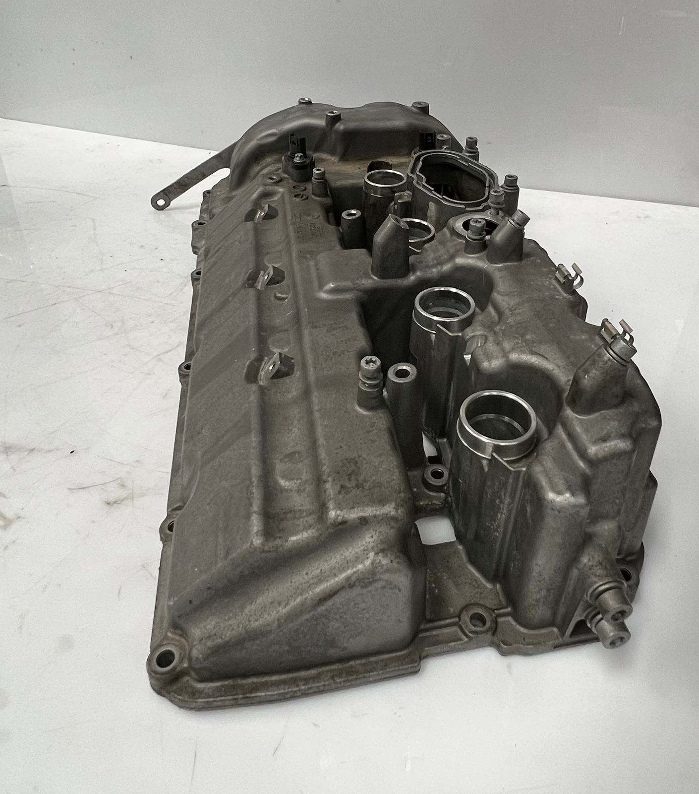 OEM Left Valve Cover for 2012-2016 BMW F10 M5 with S63 engine. 7603653