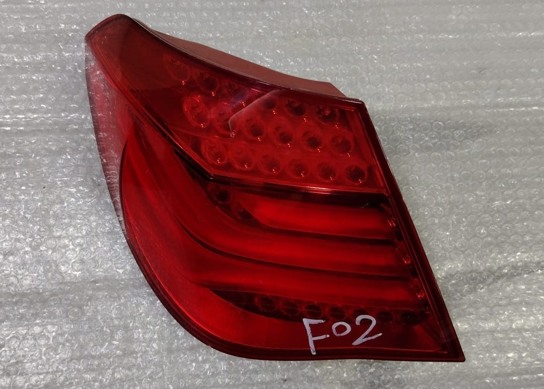 OEM BMW 7 Series F01 F02 F04 Rear Tail Light Lamp Side Panel Left 7182197