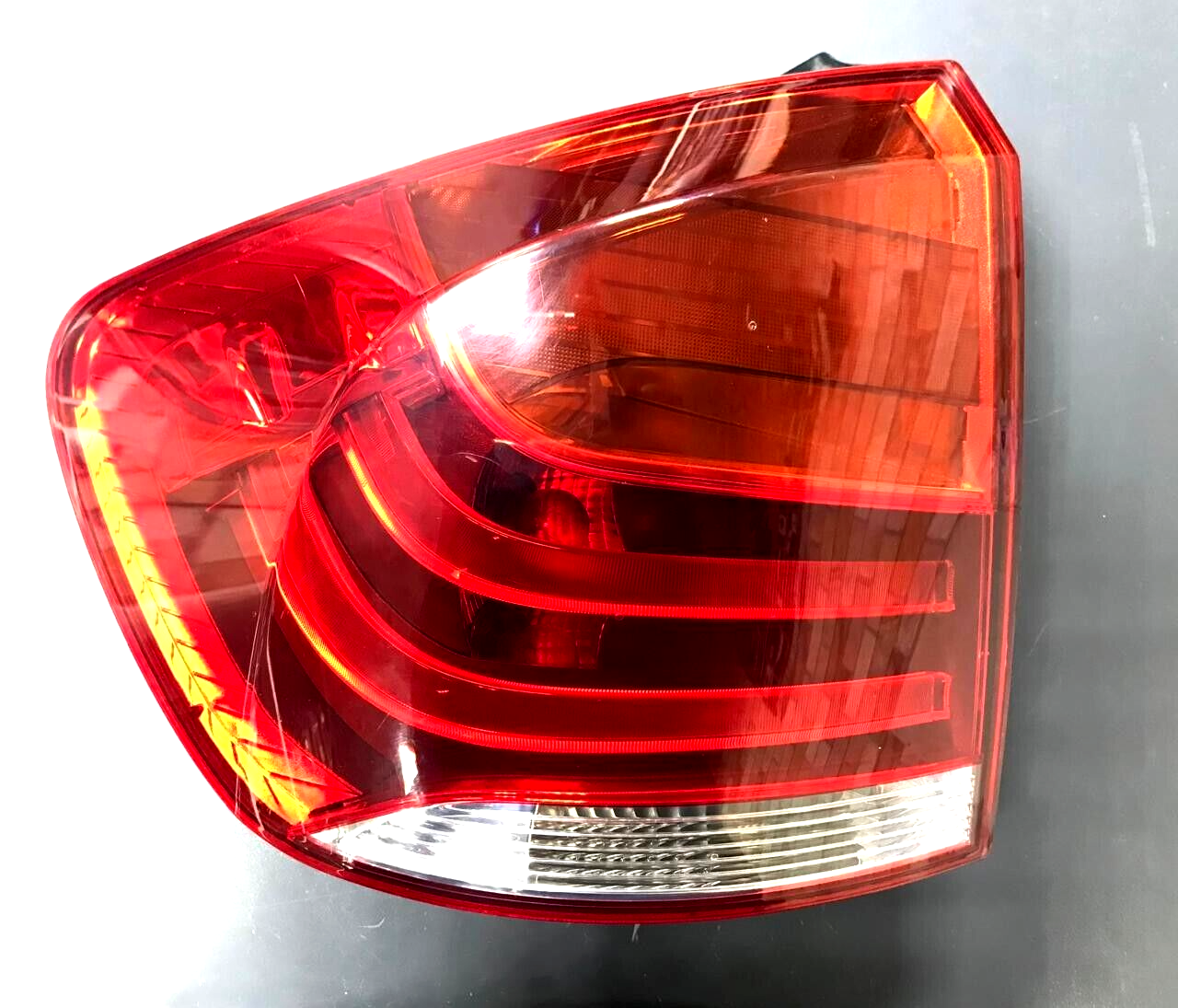 BMW X1 E84 LEFT SIDE REAR OUTER TAIL LIGHT  OEM 2990109