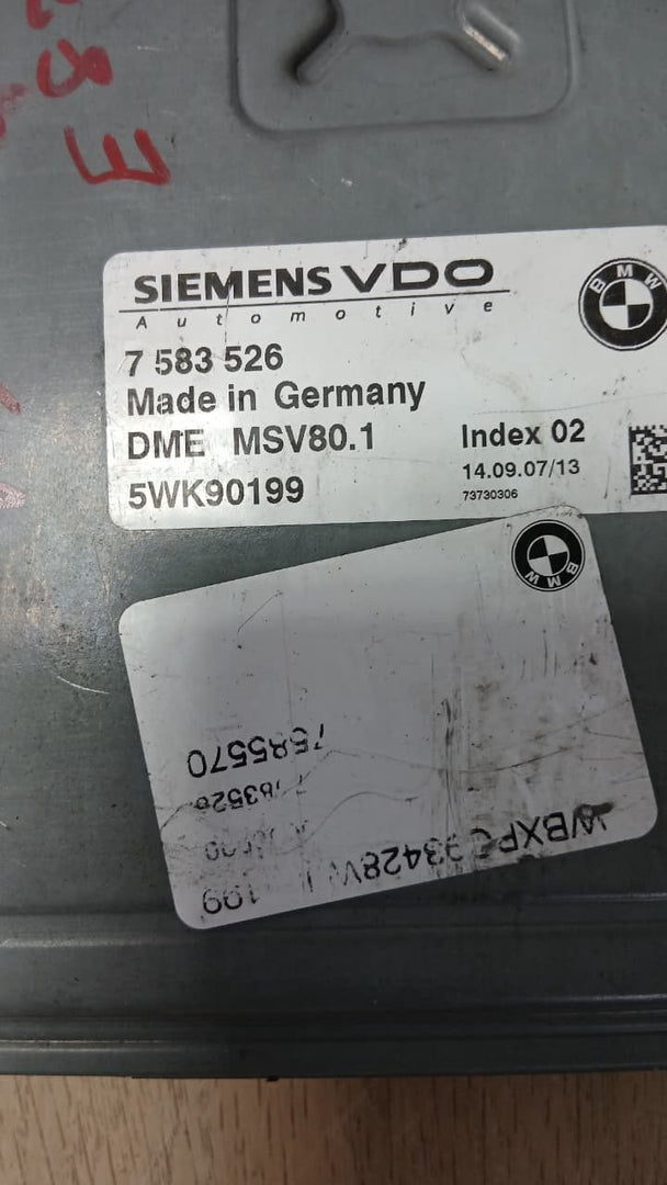 2008-2011 BMW 128i Engine Control Module 7583526 with 3.0L N51 engine.