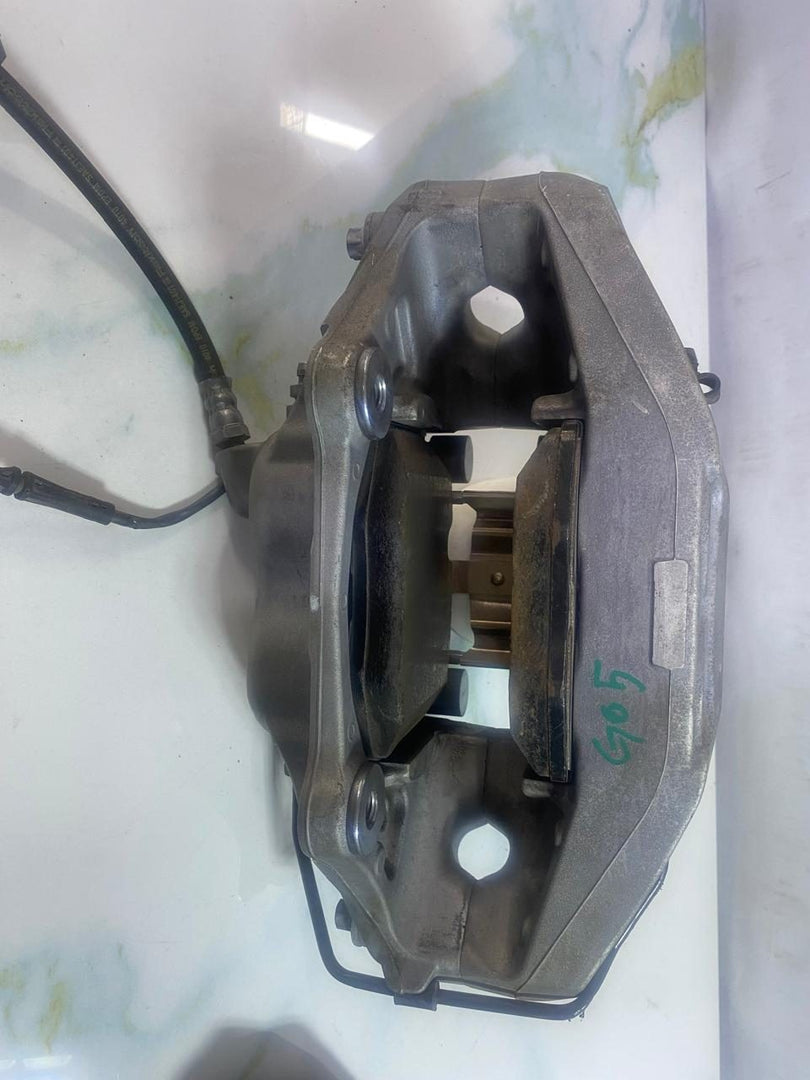 Front Brake Caliper Left, Part Number 8843331 BMW X5 G05 LCI 40I 2024