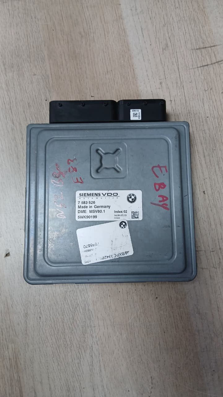 2008-2011 BMW 128i Engine Control Module 7583526 with 3.0L N51 engine.