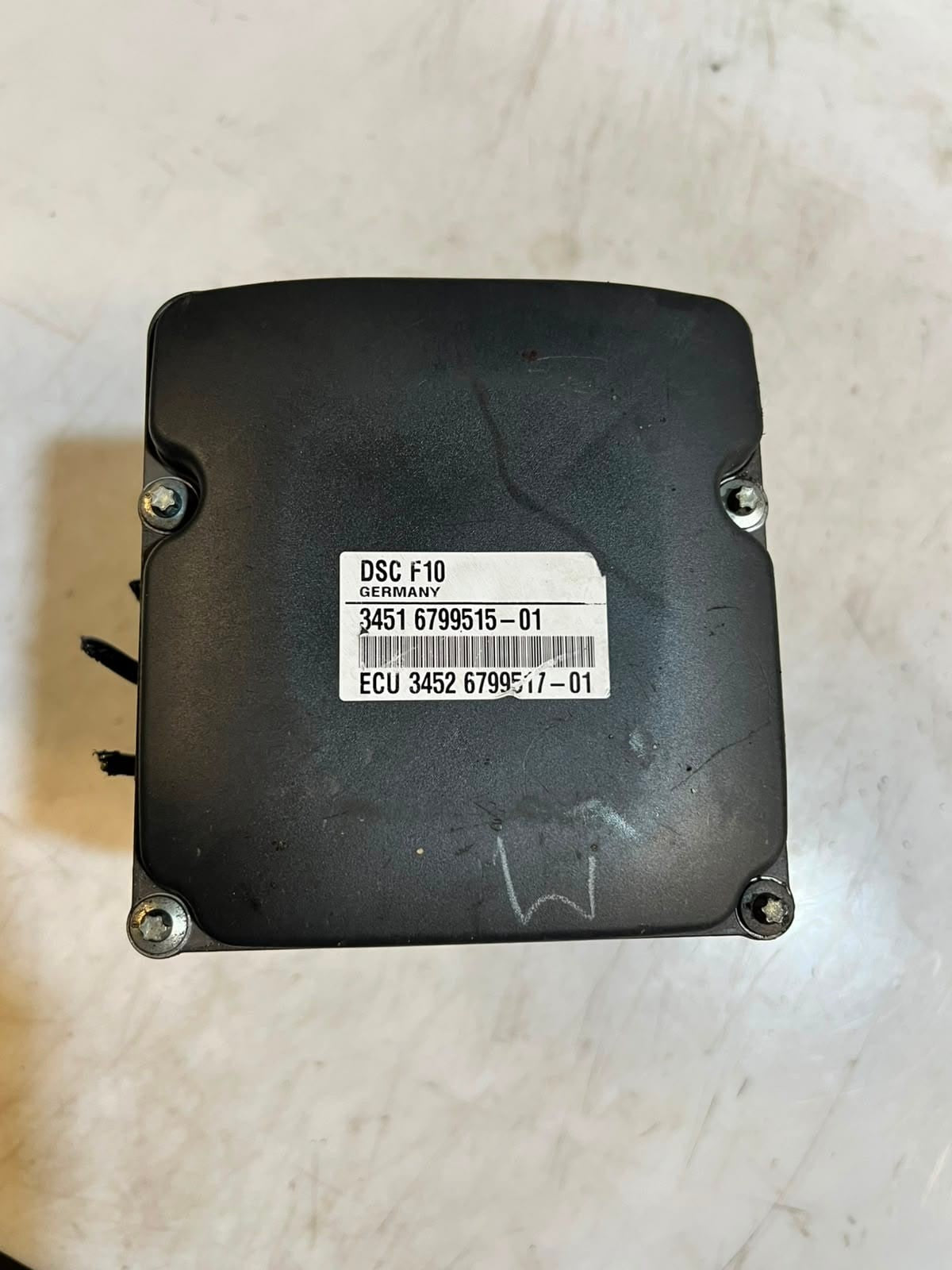 2011-2012 BMW 5-Series F07, F10, and F11 528i ABS Control Module 6799515 OEM