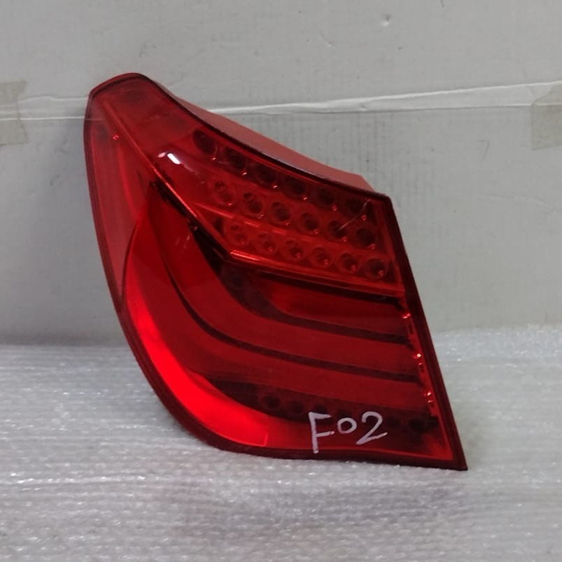 OEM BMW 7 Series F01 F02 F04 Rear Tail Light Lamp Side Panel Left 7182197