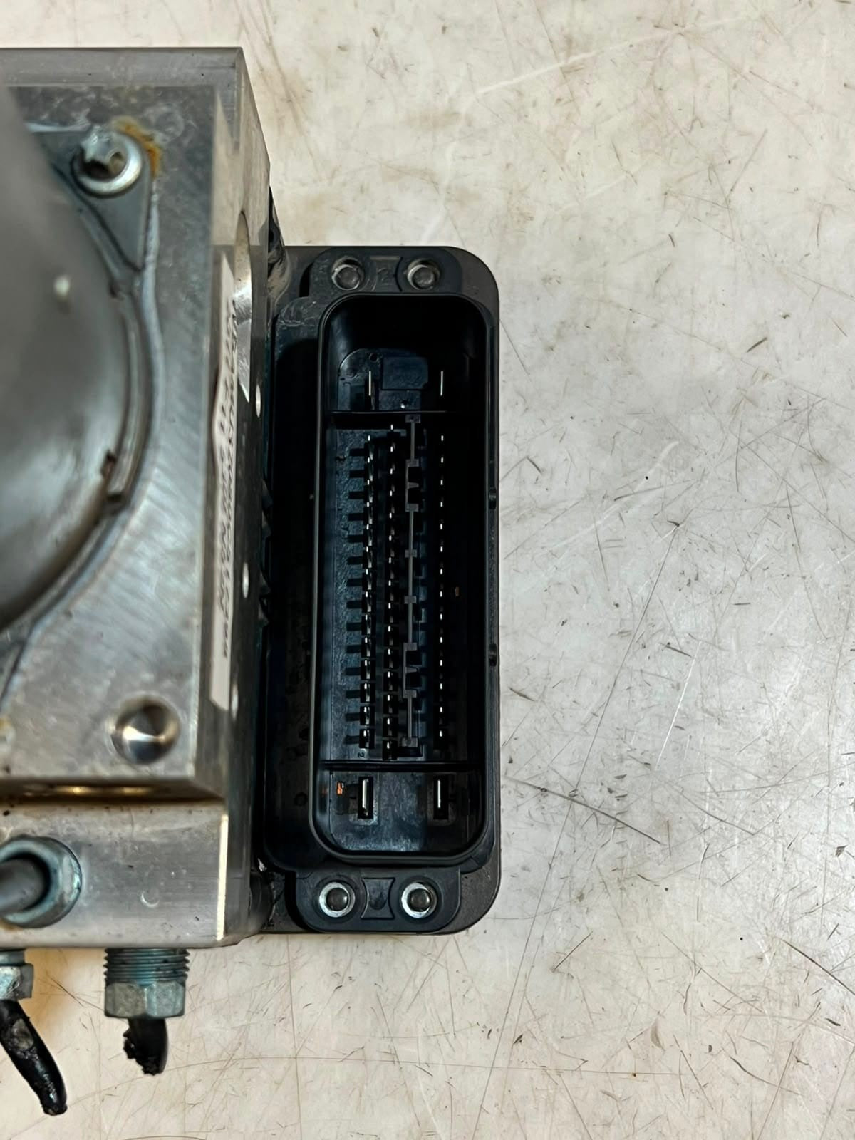 2011-2012 BMW 5-Series F07, F10, and F11 528i ABS Control Module 6799515 OEM