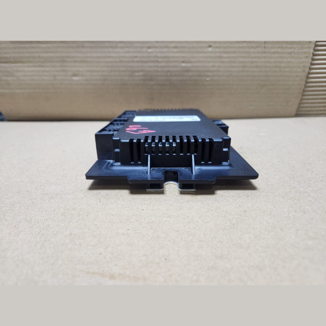 2004-2007 BMW 330i Footwell Module 9153779. E90 and E87 FRM 22