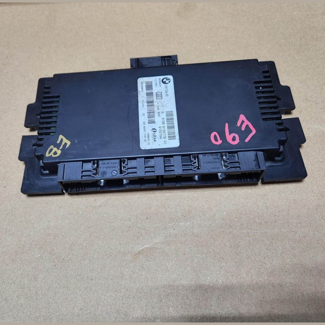 2004-2007 BMW 330i Footwell Module 9153779. E90 and E87 FRM 22