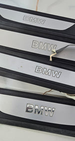 Bild in die Galerieansicht laden, OEM BMW F01 F02 Front Rear Door illuminated Sill Plate Kick door step trim Set