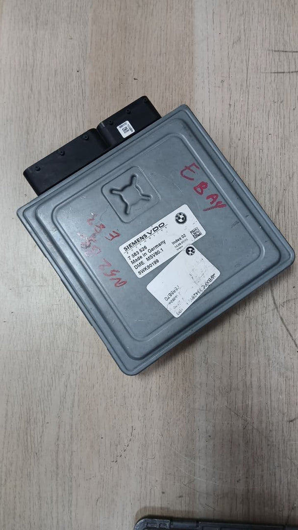 2008-2011 BMW 128i Engine Control Module 7583526 with 3.0L N51 engine.