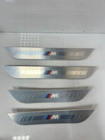 Load image into Gallery viewer, 2020-2024 BMW M850i xDrive Gran Coupe Illuminated Door Sill Trim Left 8077339