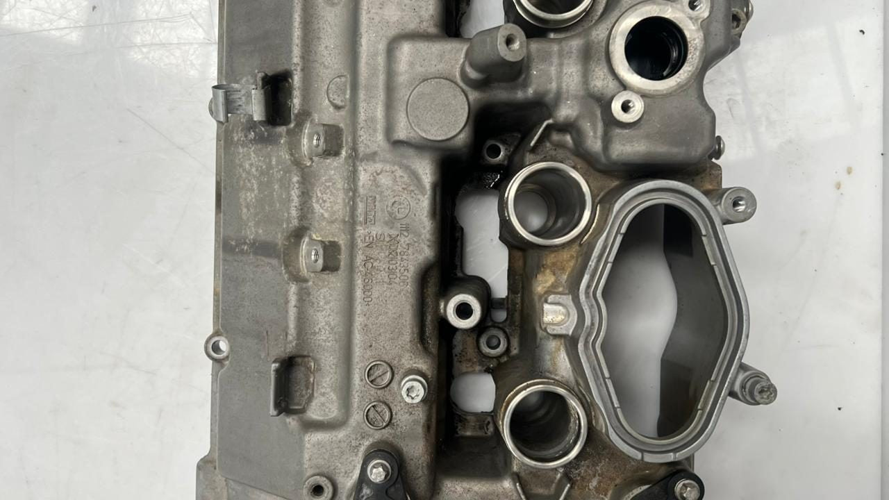 OEM right valve cover for 2012-2016 BMW F10 M5 with S63 engine. 7843506